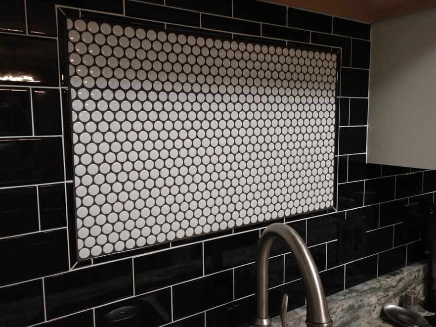 black subway tile, behind the sink, framed accent tile, penny tile, backsplash, black and white, round tile, circle tile, mosaic tile, accent tile