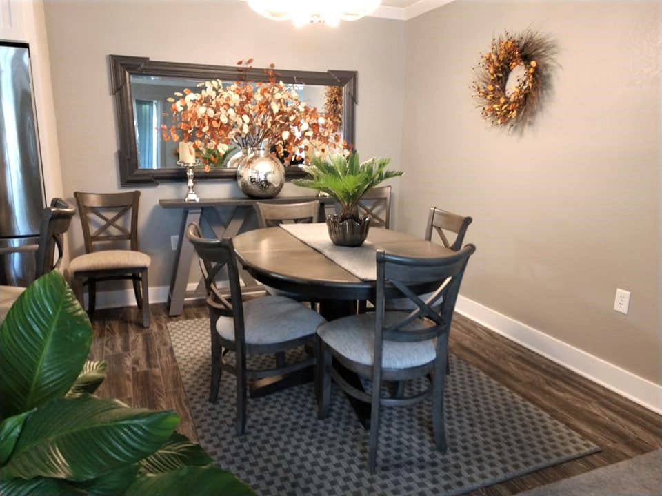 wood plank, ceramic tile, dining room, brown, taupe, carpet tile transition, checkerboard rug